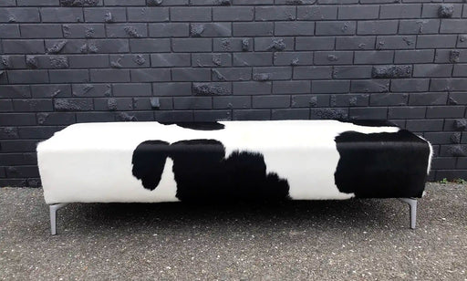 Long bench ottoman in cowhide