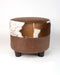 Brown and white round cowhide footstool #3