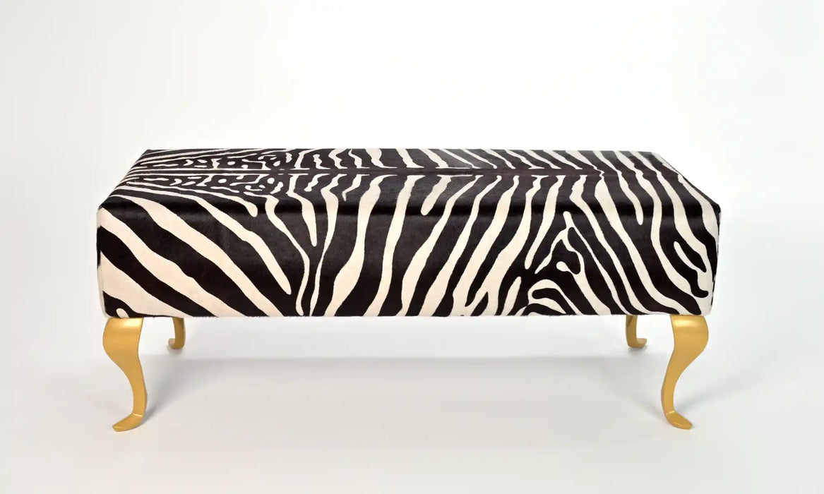 Zebra ottoman with gold legs