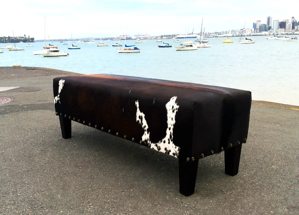 Cowhide bench ottoman with studs Texas style